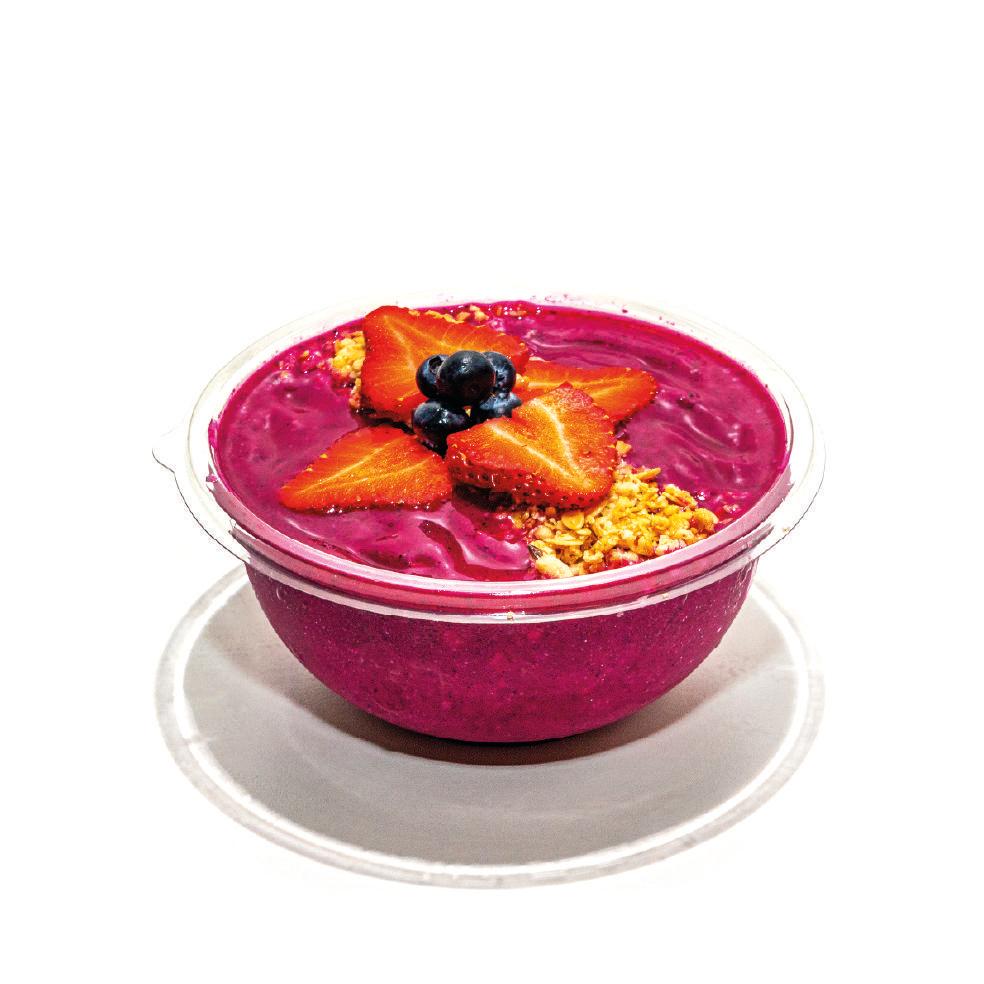 Pure Pitaya Bowl · Base: organic pitaya (dragon fruit), mango, pineapple, banana, coconut water

Toppings: blueberries, strawberries, hemp granola

Organic | non-gmo | made with love

The Pure Pitaya bowl is made with pitaya, a.k.a dragonfruit which gives the base a vibrant bright pink color and is combined with mango, pineapple and a touch of banana. The Pure Pitaya Bowl is topped with blueberries, strawberries and organic hemp granola.