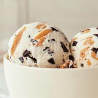 Banana Peanut Butter Chip Ice Cream · Ribbons of rich peanut butter and bits of chocolate chips are folded into sweet banana ice c...