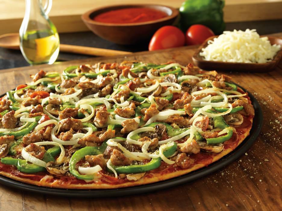 The Works Pizza · Heritage pepperoni, family recipe sausage, freshly cut green peppers and yellow onions, fresh mushrooms, Romano.