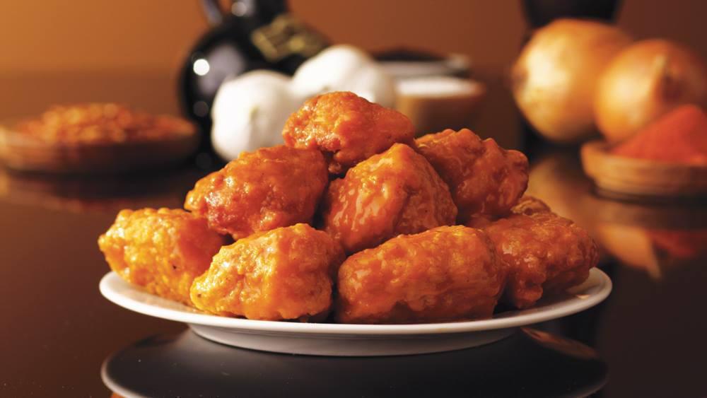 Boneless Wings · Breaded all white meat chicken hand-spun with your choice of signature donatos wing sauce.  Choice of 1 dressing.