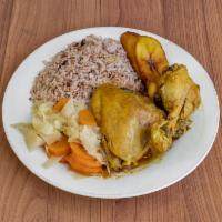 Curry Chicken · Served with rice and peas or white rice and 2 sides.