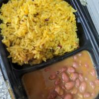 Arroz con Gandules Combo · A combination of rice with pigeon peas, cooked in the same pot with sofrito. 
This is Puerto...