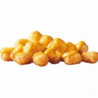 Cheese Tots · Crispy golden Brown tots smothered with warm melted American cheese. 