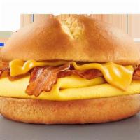 Brioche Breakfast Sandwich · Fluffy egg and melted American cheese on a soft Brioche bun with your choice of savory sausa...
