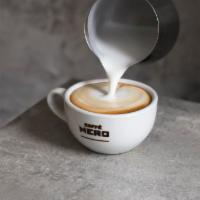 Latte · Our signature espresso, blended with plenty of silky smooth milk and finished with a light l...