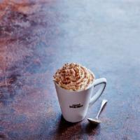 White Chocolate Mocha · Espresso, white chocolate, steamed milk topped with cream and dusted with chocolate.
