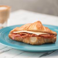 Bacon & Cheese Croissant · Hot or cold. Bacon and Swiss cheese between our classic buttery and flakey croissant.