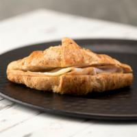 Turkey & Cheese Multigrain Croissant · Hot or cold. Sliced turkey and Swiss cheese between our buttery and flakey whole grain crois...