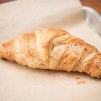 Whole Grain Croissant · Buttery and flakey croissant made with the addition of whole grains.