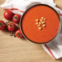 Creamy Tomato Soup · A delicious medley of tomatoes, cream, spices, and garlic all simmered in a rich broth.
