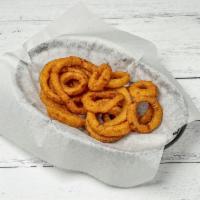 Onion Rings  · Crispy onion slices deep-fried until golden-brown. 