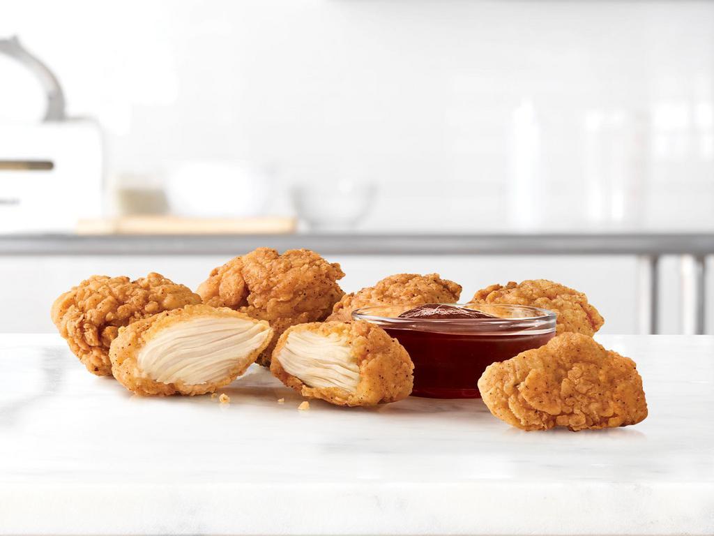 Premium Nuggets · 100% white meat chicken in a crispy seasoned breading.