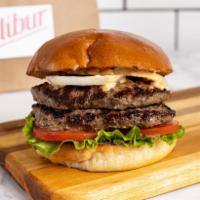 Double Hamburger by Calibur Express  · By Calibur Express. 1/2 lb fresh, organic, grass fed California beef. Served with lettuce, t...