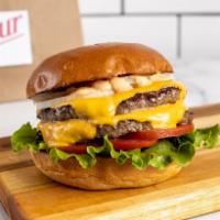 Double Cheeseburger · 1/2 lb fresh, organic, grass fed California beef with double American cheese. Served with le...