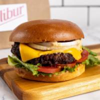 Veggie Cheeseburger by Calibur Express  · By Calibur Express. Fresh housemade veggie patty with sharp cheddar cheese. Served with lett...