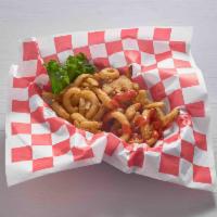 Onion Straws · Served with Southwestern dipping sauce.