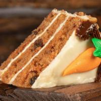 CARROT CAKE · Classic carrot cake with layers of cream cheese icing.