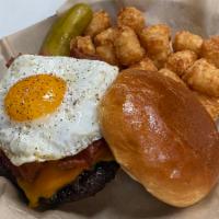 Bacon - Egg - Cheese Burger · Beef patty, bacon, fried egg, cheddar cheese served on a brioche bun.