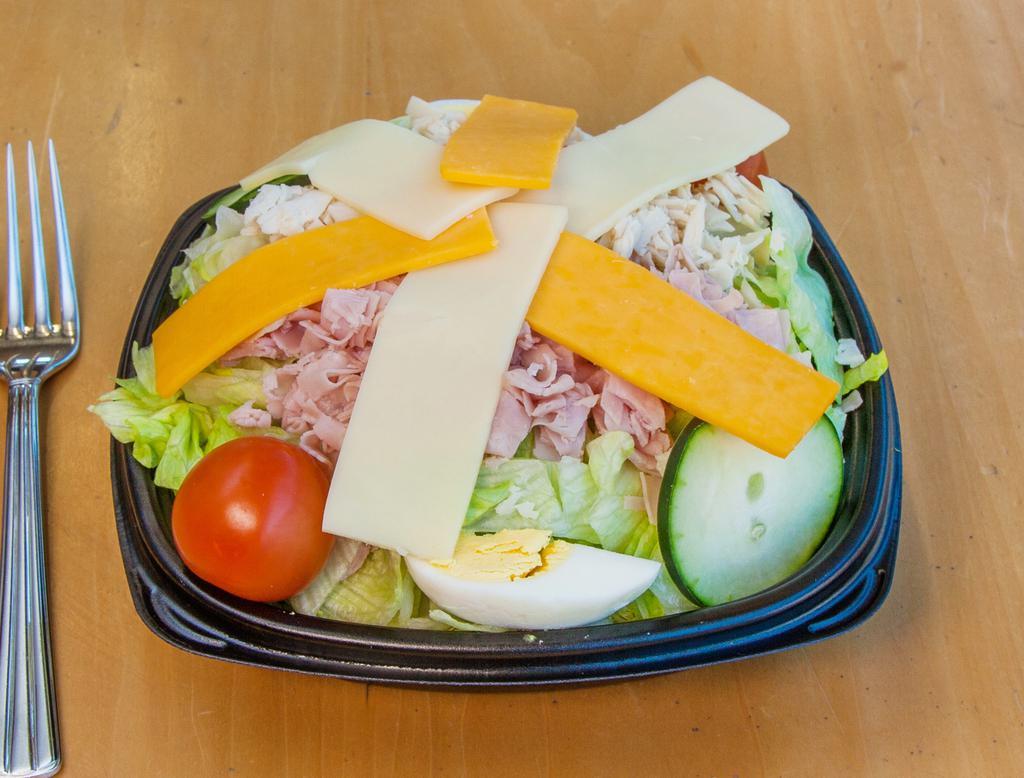 Chef's Salad · Garden salad with ham, turkey, hard boiled egg, American and Swiss.
