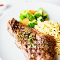 Grilled New York Steak · 10 oz. NY Steak and a side of steamed vegetables, side spaghetti olive oil and garlic.