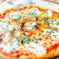 Margherita Pizza · Marinara, mozzarella, fresh mozzarella slices and basil.