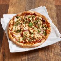 BBQ Chicken Pizza · Mozzarella, BBQ sauce, grilled chicken, red onions and cilantro.