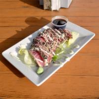 Sesame Encrusted Ahi Tuna with Wasabi · Wild Caught Sesame Encrusted Tuna Prepared in Sesame Oil. Sliced Thin and Drizzled with Wasa...