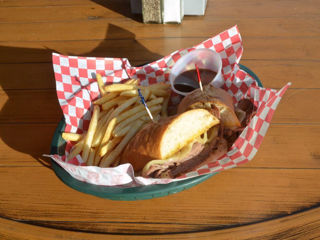 French Dip Sandwich · Thin sliced roast beef and Cheese piled high on a toasted hoagie roll with au jus.