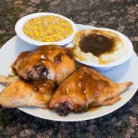 1/2 Smothered Chicken Dinner · Served with 2 sides and bread.