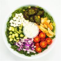 Falafel-osophy · kale + romaine, grape tomatoes, red onions, cucumbers, pita chips, feta cheese, falafel, hum...