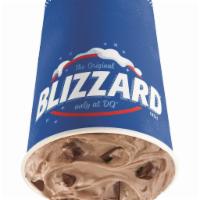 Brownie Dough Blizzard® Treat · Brownie dough pieces, choco chunks and Cocoa Fudge blended with creamy DQ® vanilla soft serv...