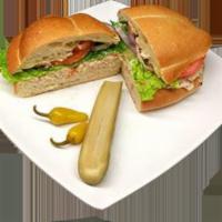 Albacore Tuna Sandwich · Served with albacore tuna, red onions, lettuce, tomato and wasabi mayo. Choose from torta an...