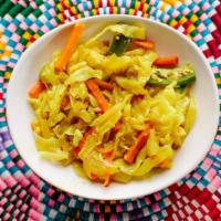 Tikle Gomen (VG, GF) by Demera Favorites · Chopped cabbage and carrots slow cooked with onions, garlic, ginger, and turmeric. Contains ...