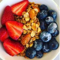 Granola Bowl · Choice of granola and milk with 2 toppings.