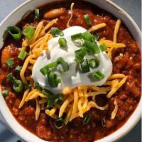 Turkey Chili · Topped with sour cream, cheddar cheese and scallions.
