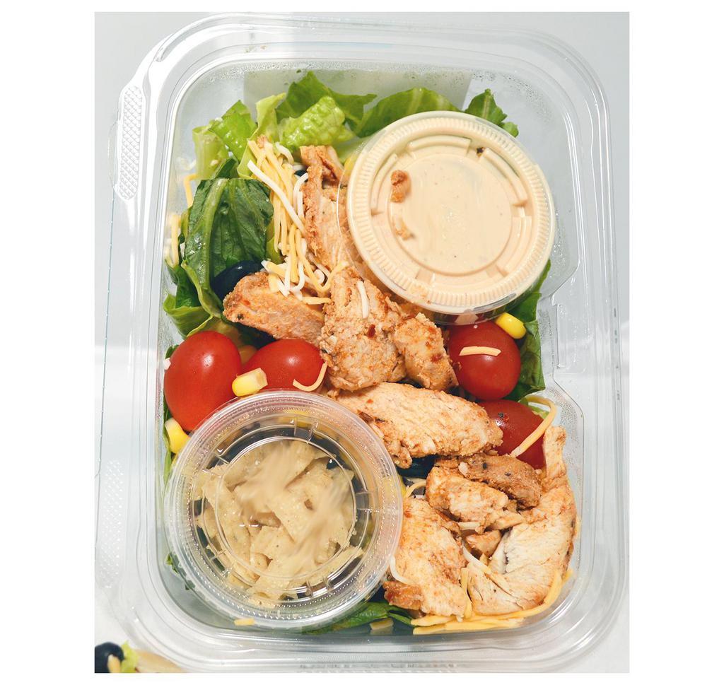 Southwest Chicken Salad · Organic Romaine, Organic Red Onion, Organic Red & Yellow Peppers, Black Beans, Corn, Green Onion, Black Olives, Mexican Mix Cheese, Tortilla Strips, ABF Chicken, with Chipotle Ranch Dressing