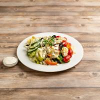 Greek Salad · Lettuce, Tomatoes, Onion, Olives, Cucumber, Artichoke Hearts And Feta Cheese.
