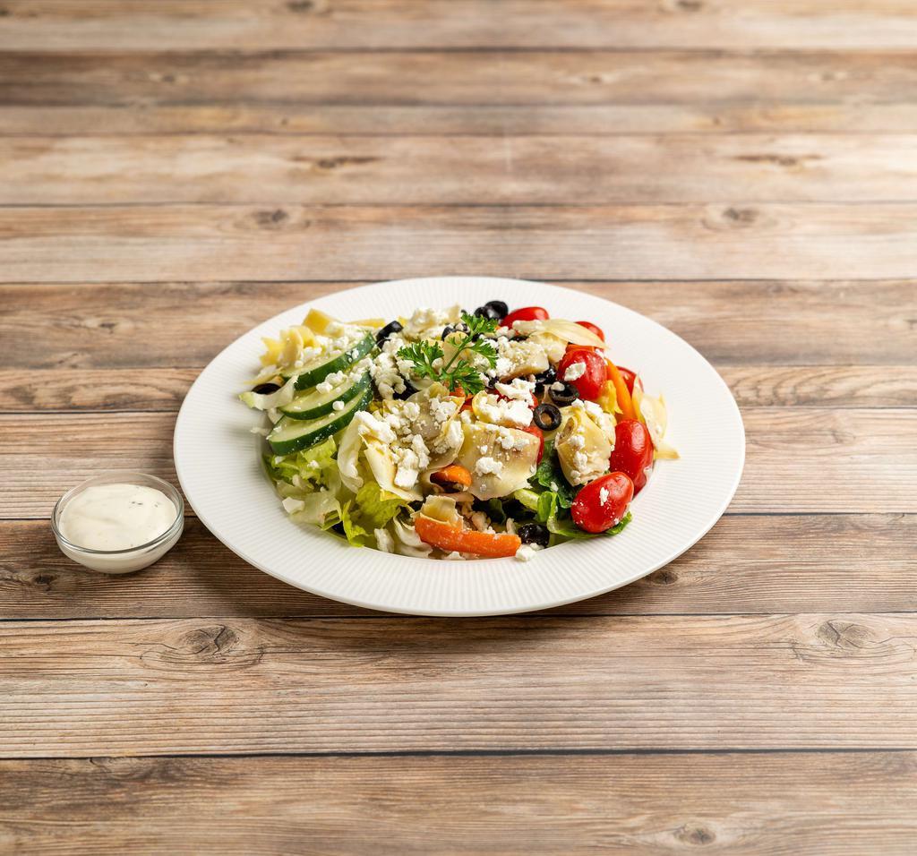 Greek Salad · Lettuce, Tomatoes, Onion, Olives, Cucumber, Artichoke Hearts And Feta Cheese.
