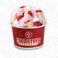 Surrender To Strawberry · Strawberry ice cream with strawberries, yellow cake, and whipped topping.