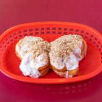 Butterfly Donut · Cinnamon swirls topped with icing and crumbs.