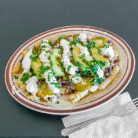 Asada Fries  · Fries with steak, cheese, sour cream, guacamole