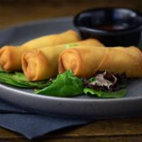 Spring Rolls · Two mixed vegetable spring rolls served with sweet and sour sauce.