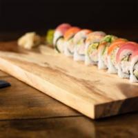 *Rainbow Roll · Crab mix, avocado, cucumber topped with tuna, salmon, yellowtail, shrimp, and avocado.