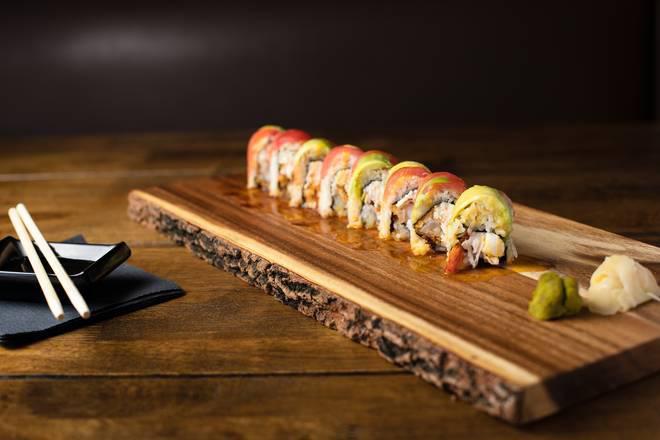 Rasta Roll · Coconut shrimp, cream cheese and crab mix, topped with tuna, mango, avocado, finished with mango sauce and eel sauce.