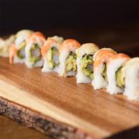 *Tucson Roll · Shrimp tempura, cucumber avocado, topped with salmon, lemon slices and ponzu sauce.