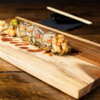 *Fuku in Vegas Roll · Tuna, salmon, yellowtail, cucumber and cream cheese, lightly tempura battered and topped wit...