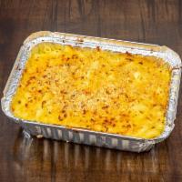 Large Mac Shack · Traditional baked mac and cheese elbow pasta, cheese sauce. 6 blend cheese and breadcrumbs.
