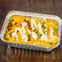 Regular Loaded Mac · Shell pasta, cheese sauce, chicken, bacon, cheddar blend, green onions, topped. Served with ...