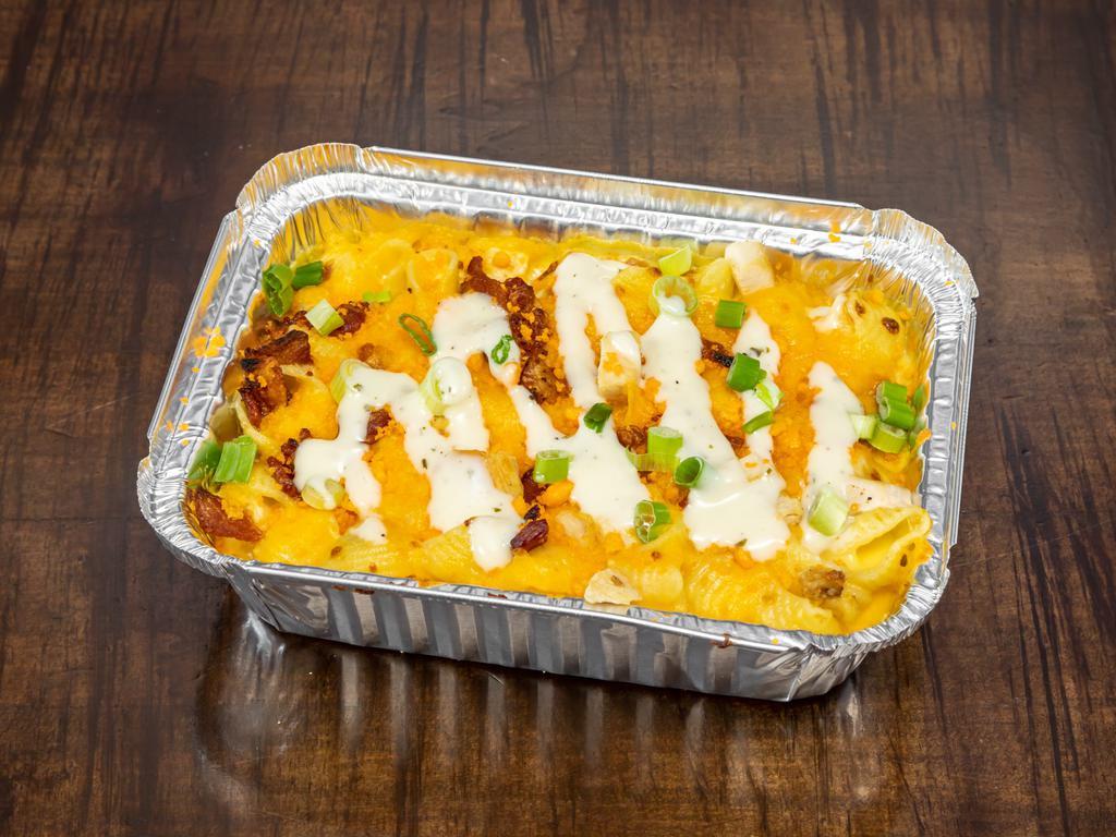 Large Loaded Mac · Shell pasta, cheese sauce, chicken, bacon, cheddar blend, green onions, topped with ranch dressing and crumbled cheetos
