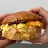 Pop!s Breakfast Sando · scrambled eggs w chives, american cheese, bacon, pop’s secret sauce, brioche bun